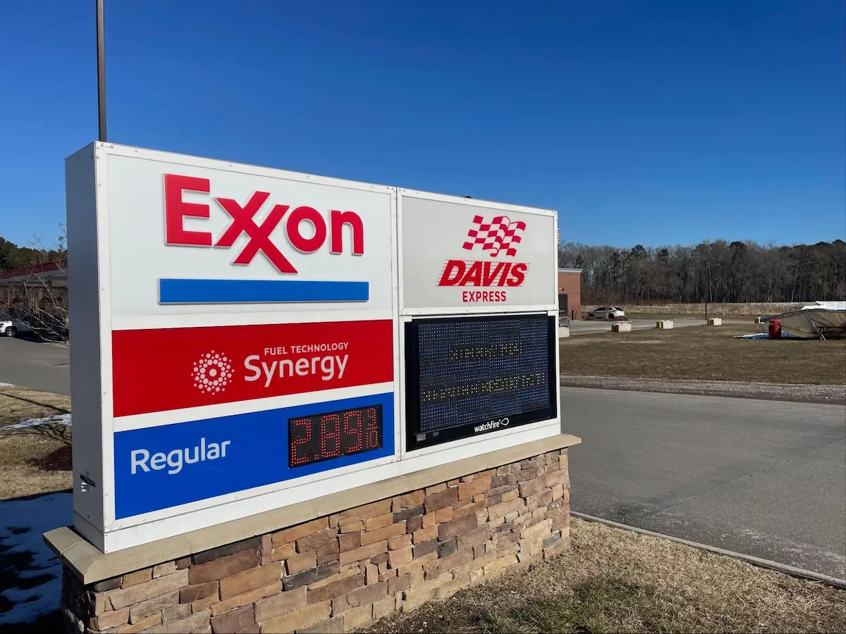 Exxon gas price sign in front of Davis Express